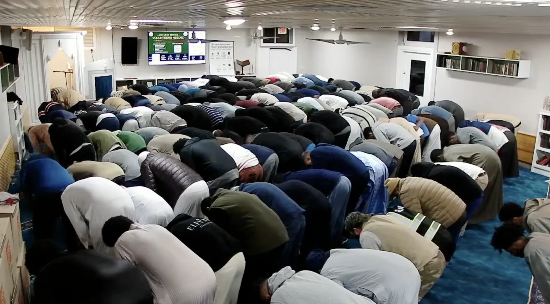 The congregation praying together at ICC